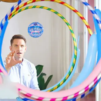 man playing with Cosmic Globe